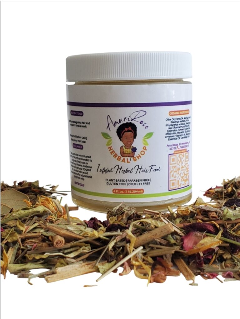 Organic Infused Herbal Hair Food jar, 4 fl oz plant-based hair treatment surrounded by dried herbs and botanicals. Plant-based, paraben-free, gluten-free, cruelty-free hair care product with natural ingredients including olive oil, jojoba oil and herbs for hair growth and health.
